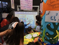 Kids Interacting with their books made with Q-Tales